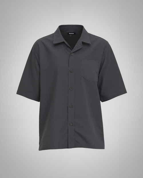 A black short-sleeve button-up shirt with a regular fit, made from 100% organically grown cotton. Designed with a structured spread collar, a single square chest pocket with precise topstitching, and a clean five-button front closure with tonal matte black buttons. The lightweight fabric has a soft matte finish, creating a refined yet relaxed silhouette.